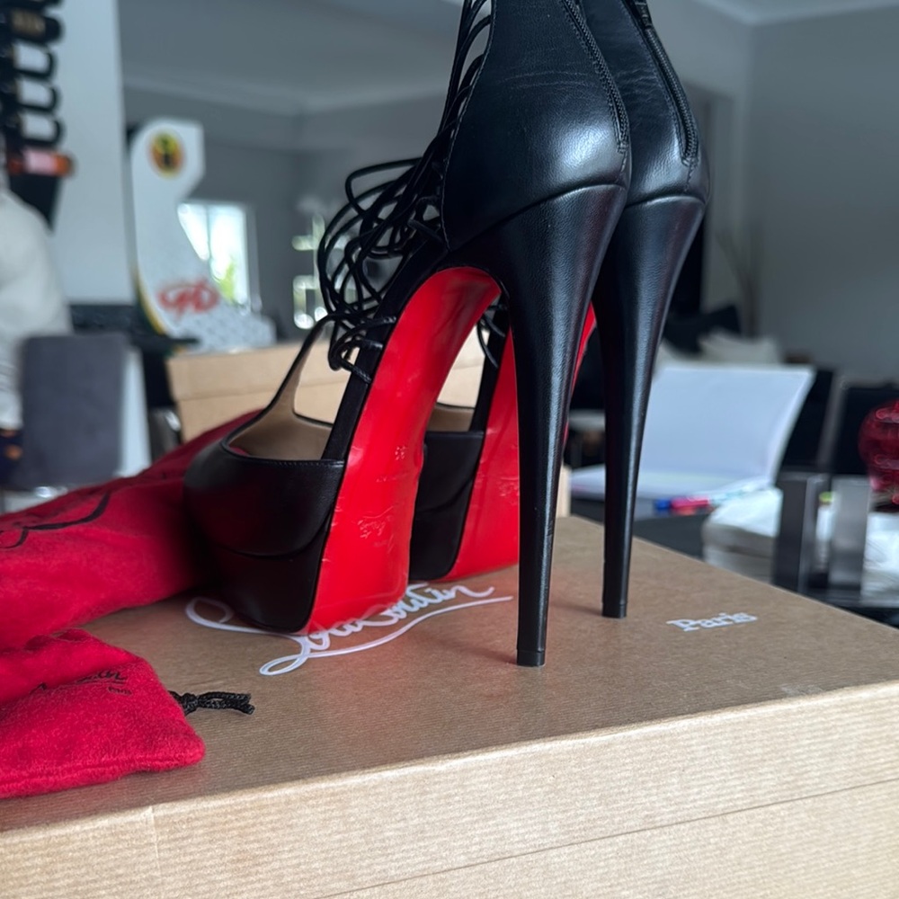 Christian Louboutin Black Heels Sophisticated Design